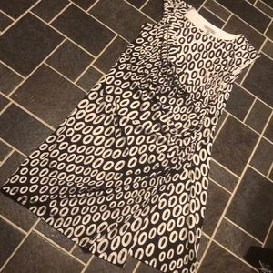 Graphic black and white mock-wrap dress